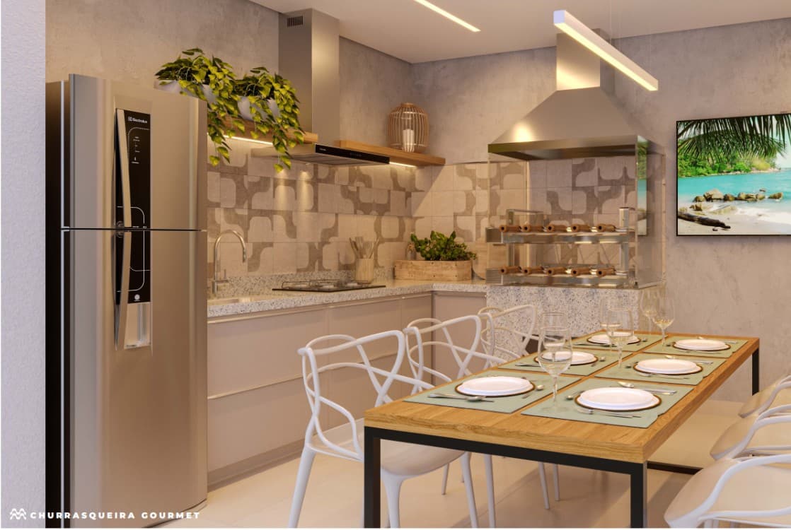 Espaço gourmet com churrasqueira, pia, geladeira e mesa de jantar