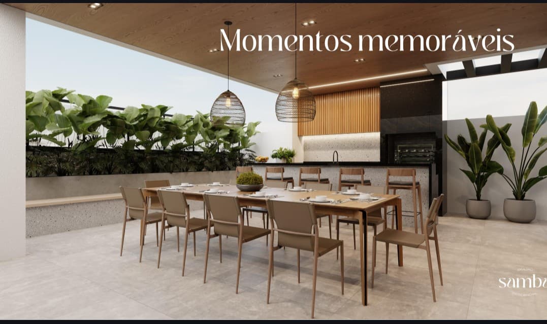 Área gourmet externa com mesa de jantar, cadeiras, bancada com banquetas e paisagismo.